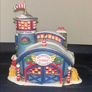 Department 56 North Pole Reindeer Flight School with Red and White Accents